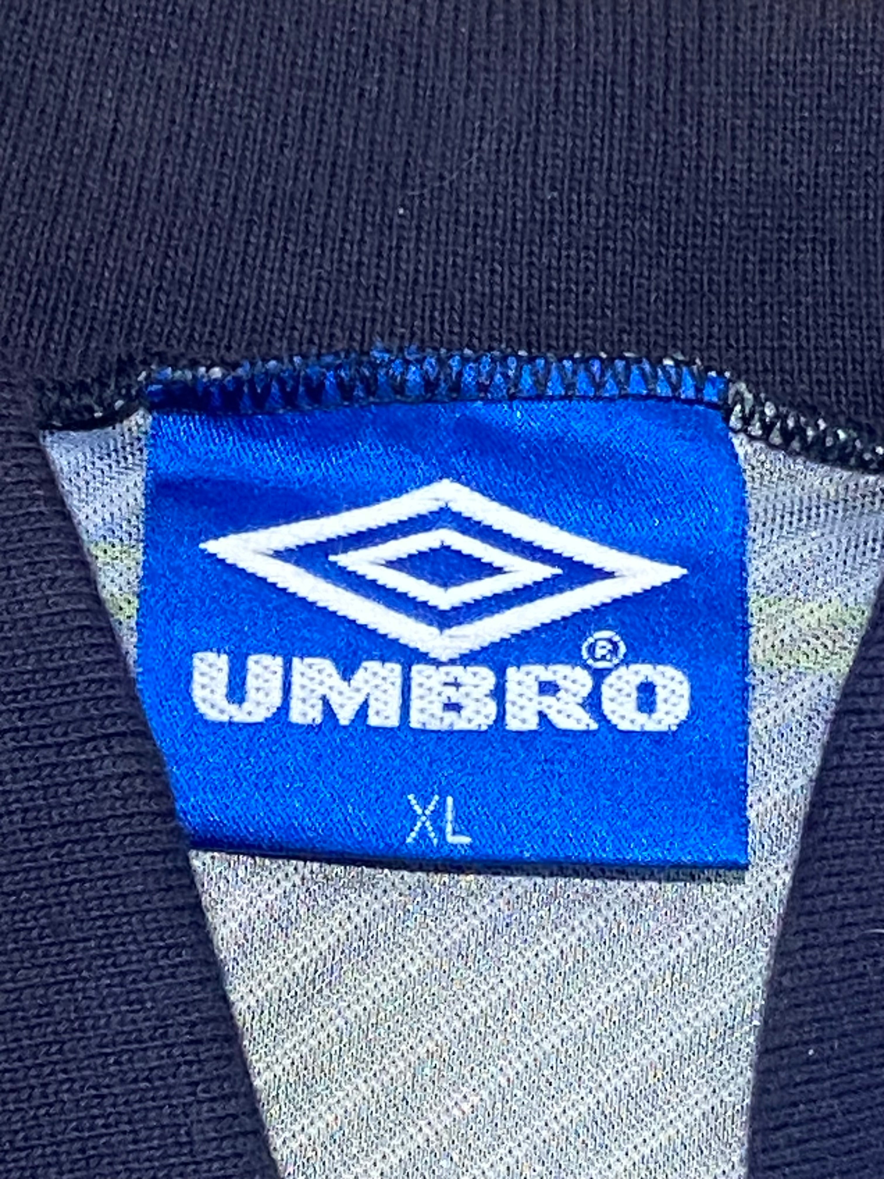 Maillot de foot de l’Écosse (porté par le N.20 BOOTH) contre les USA en 1996 (certificat d’authenticité fourni)