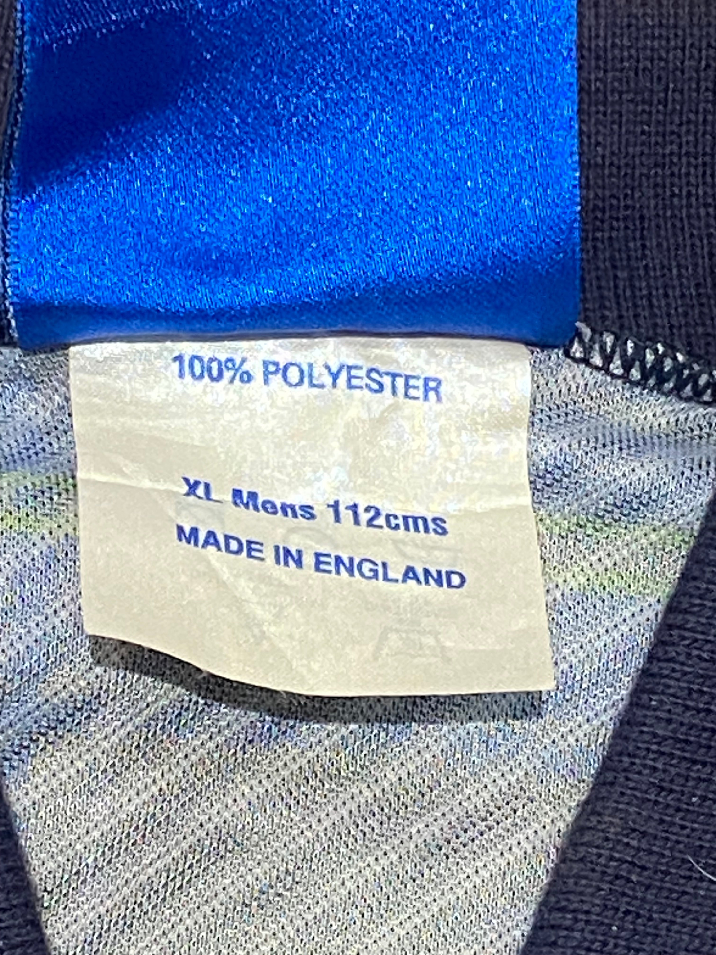 Maillot de foot de l’Écosse (porté par le N.20 BOOTH) contre les USA en 1996 (certificat d’authenticité fourni)